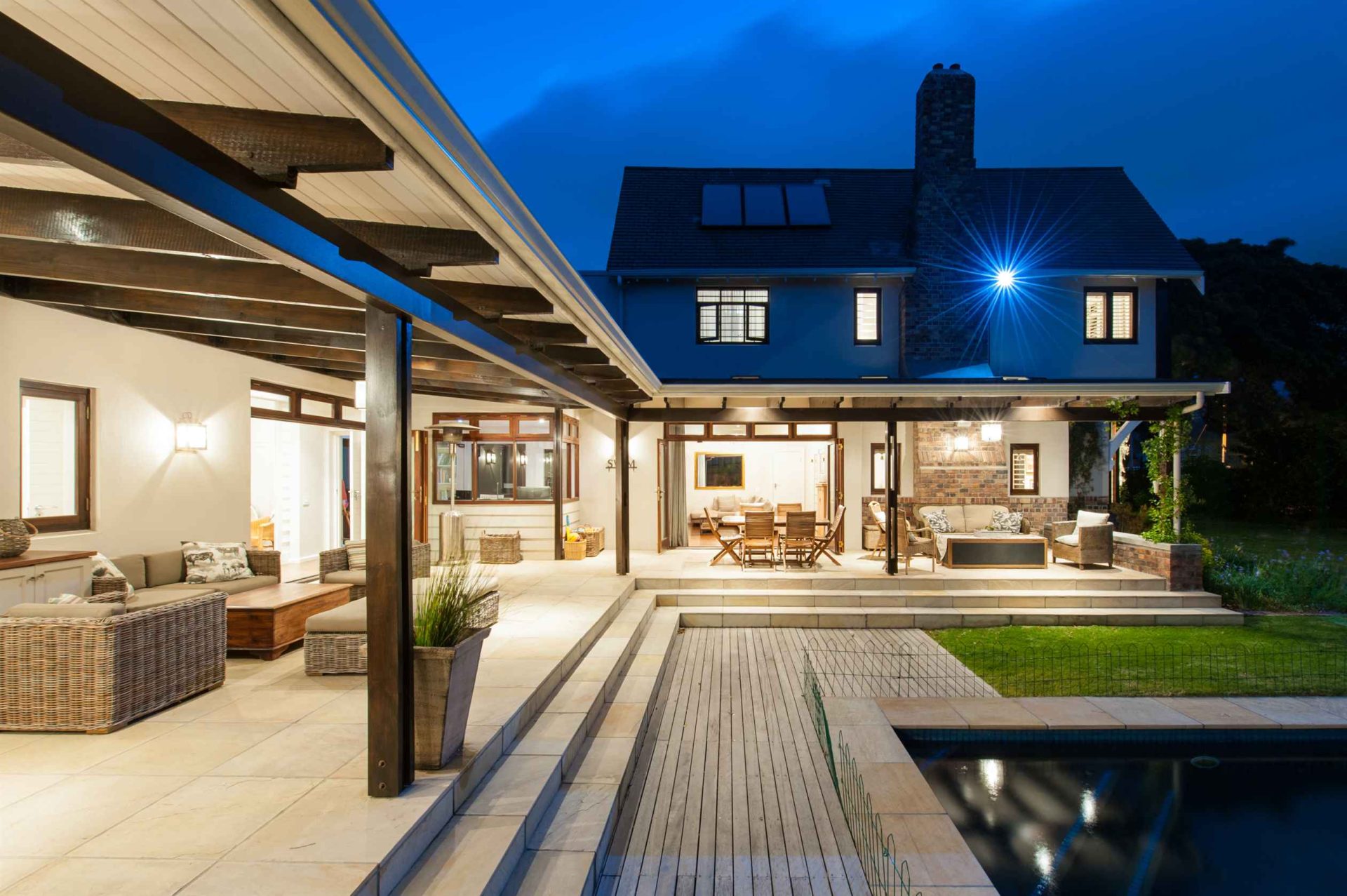 Beautiful old style yet modern contemporary home with a large brick chimney