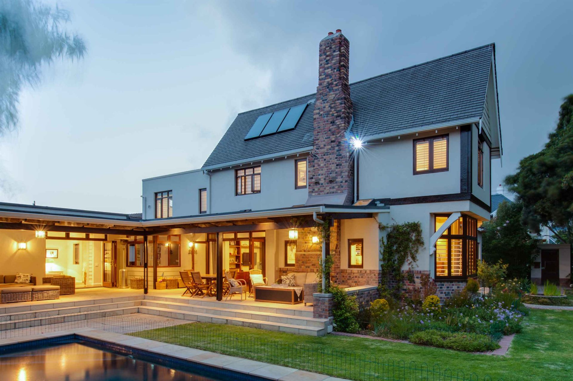 Beautiful old style yet modern contemporary home with a large brick chimney